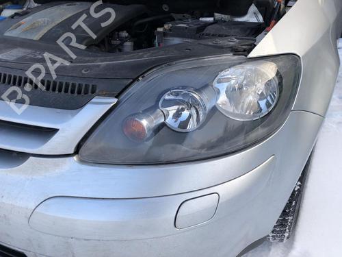 Left headlight VW GOLF PLUS V (5M1, 521) 1.6 FSI | BP31959589C28 
