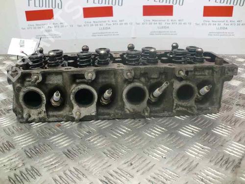 Used Cylinder head OPEL OMEGA B Estate (V94) 2.0 (F35, M35, P35) (116 hp) 10977023