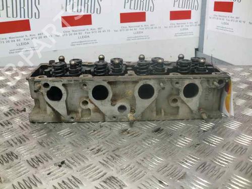 Used Cylinder head OPEL KADETT E Estate (T85) 1.8 i (C15, C35, D15, D35) (90 hp) 10976848