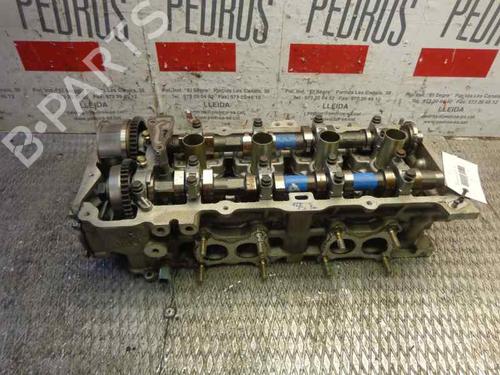 Used Cylinder head NISSAN ALMERA II (N16) 1.8 (114 hp) 10976863