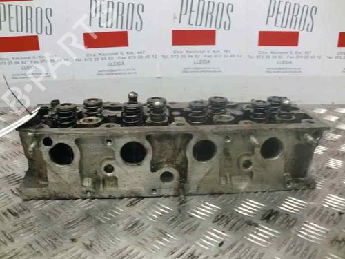 Used Cylinder head OPEL CALIBRA A (C89) 2.0 i (M07) (115 hp) 10976823
