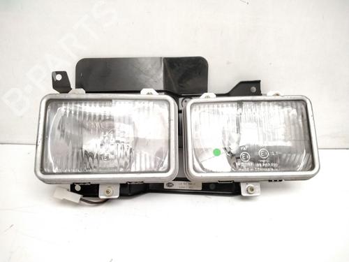 Used Left headlight NISSAN VANETTE Bus (C22) 2.4 i (SLC22) (101 hp) 25228202