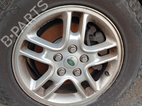 Used Left front brake caliper LAND ROVER DISCOVERY III (L319) 2.7 TD 4x4 (190 hp) 32015037