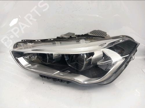 Used Left headlight BMW X1 (F48) sDrive 18 d (150 hp) 31607869