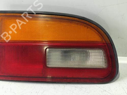 Feu de coffre gauche MITSUBISHI L400 Van (PD_W, PC_W, PB_V, PA_W, PA_V) 2500 TD (PD5W, PD5V, PA5W, PA5V) (87 hp) 32731344