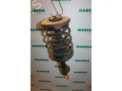 Used Left front shock absorber RENAULT MEGANE I Coach (DA0/1_) 1.9 dTi (DA0N) (98 hp) 31453195
