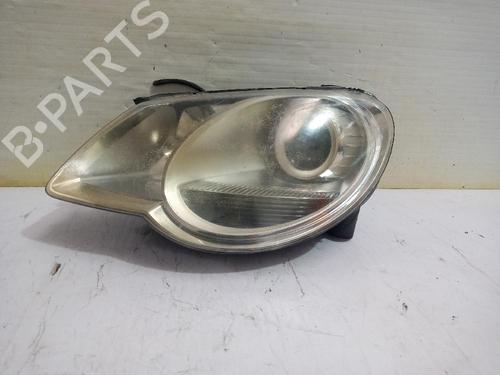 Used Left headlight VW EOS (1F7, 1F8) 2.0 FSI (150 hp) 31559765
