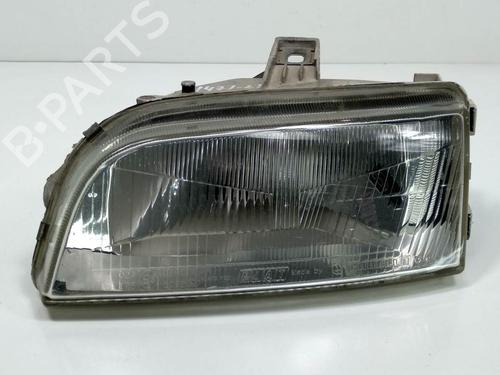 Used Left headlight Left headlight FIAT PUNTO (176_) 1.7 TD (69 hp) 8587566 8587566