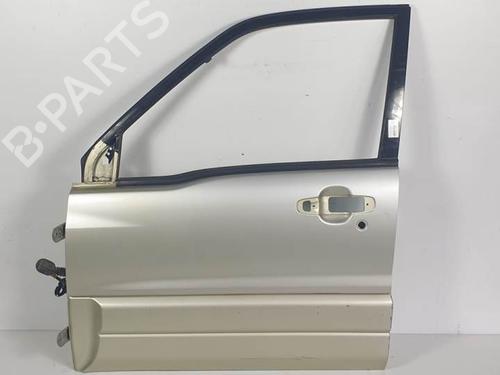 Left front door SUZUKI GRAND VITARA I (FT, HT) 2.5 V6 24V 4x4 (TD62, SQ625) BP16358216C2