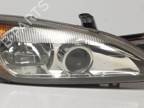 Used Right headlight NISSAN PRIMERA Hatchback (P11) 2.0 16V (131 hp) 25138464