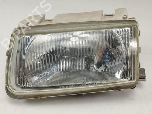 Used Left headlight VW POLO III (6N1) 60 1.4 (60 hp) 9970136