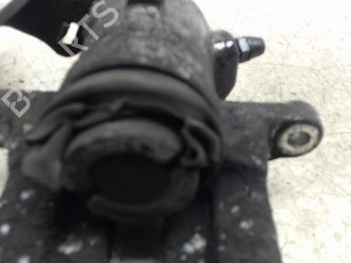 Used Left rear brake caliper Left rear brake caliper AUDI A1 Sportback (8XA, 8XF) 1.4 TDI (90 hp) 36744566 36744566