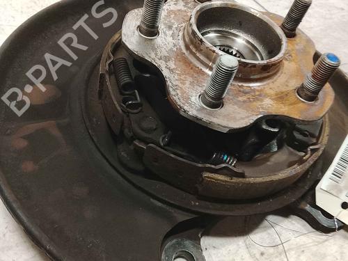 Used Right rear steering knuckle Right rear steering knuckle RENAULT KOLEOS I (HY_) 2.0 dCi 4x4 (HY0K) (150 hp) 36712982 36712982