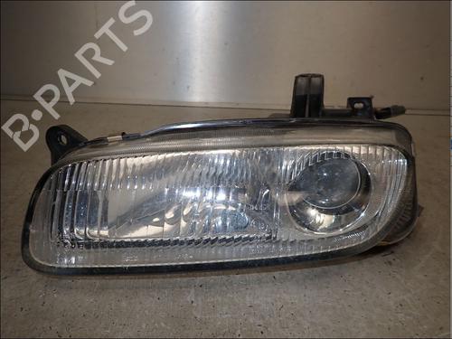 Used Left headlight Left headlight MAZDA 323 P V (BA) 1.5 16V (88 hp) 34033392 34033392