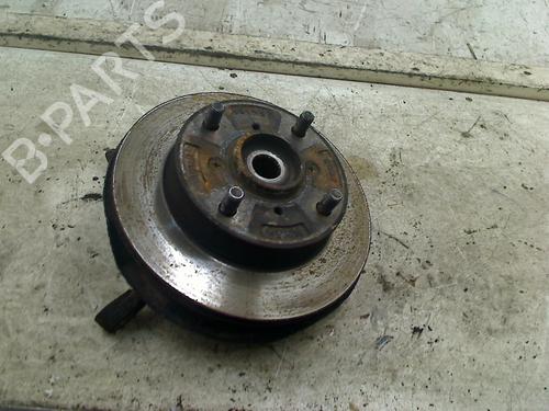Used Right front steering knuckle Right front steering knuckle SUZUKI SWIFT II Hatchback (EA, MA) 1.0 i (SF310, AA44) (53 hp) 34657995 34657995