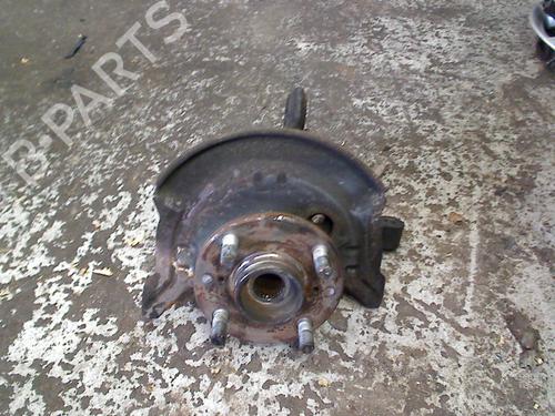 Used Right front steering knuckle Right front steering knuckle DAIHATSU SIRION (M1) 1.0 i (M100) (56 hp) 34663736 34663736