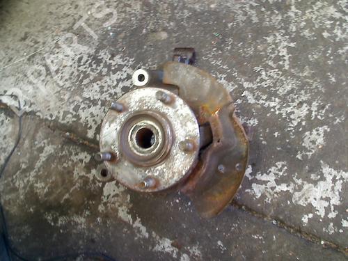 Used Left front steering knuckle Left front steering knuckle MAZDA PREMACY (CP) 1.9 (CP8W) (100 hp) 34664742 34664742