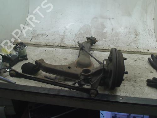 Used Right rear steering knuckle Right rear steering knuckle SUZUKI SWIFT II Hatchback (EA, MA) 1.0 i (SF310, AA44) (53 hp) 34657999 34657999