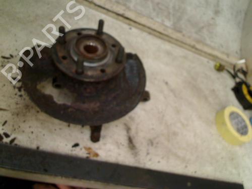 Used Left front steering knuckle Left front steering knuckle MITSUBISHI SPACE STAR MPV (DG_A) 1.9 DI-D (DG4A) (102 hp) 34658240 34658240