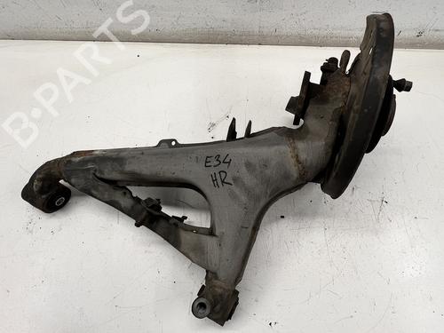 Manga de eixo trás direita Manga de eixo trás direita BMW 5 (E34) 525 i 24V (192 hp) 39681978 39681978